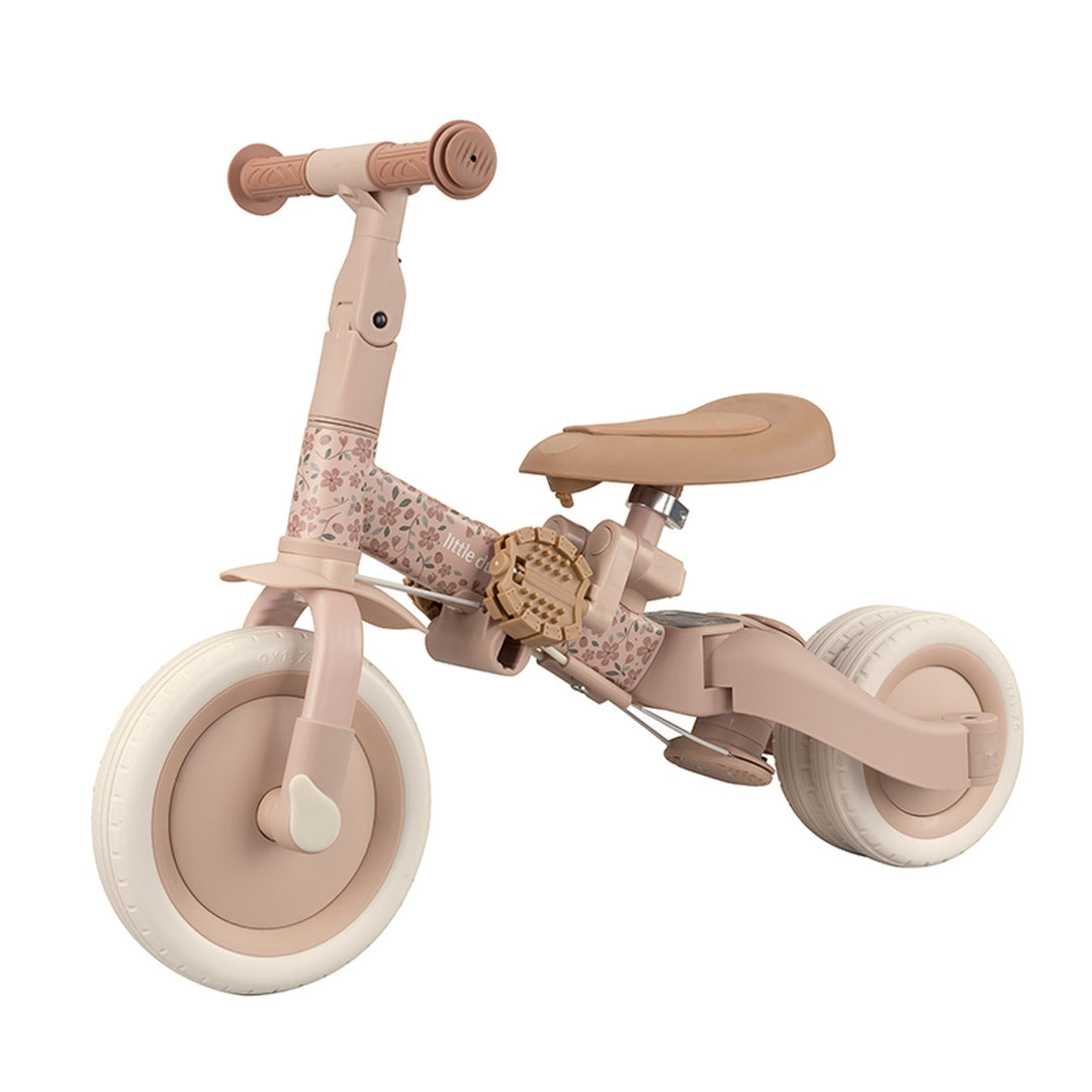 Mitwachsendes 4-in-1 Laufrad Fairy Floral Rosa mit Fußstützen und höhenverstellbarem Sattel. Hochwertiges Kinderfahrzeug für Kinder ab 1 Jahr zur Förderung von Gleichgewicht, Motorik und selbstständigem Fahren – flexibel vom Dreirad zum Laufrad wandelbar.