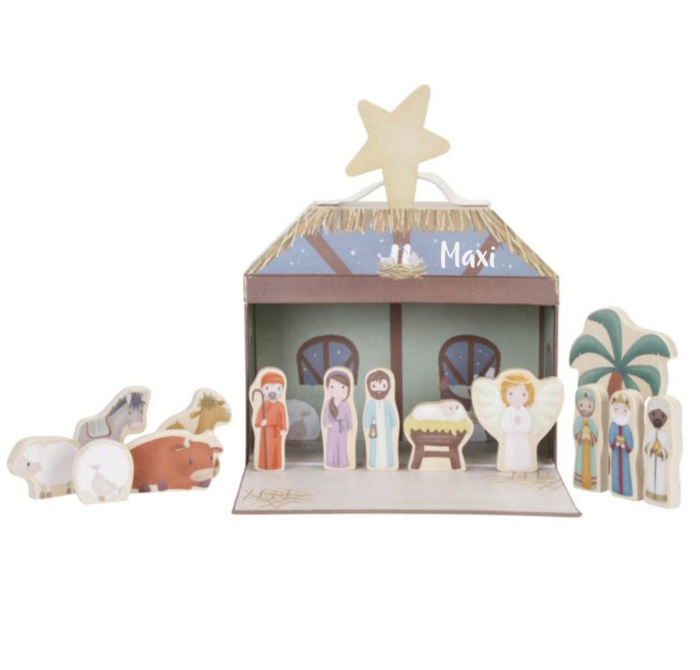 Christmas nativity scene with toy suitcase