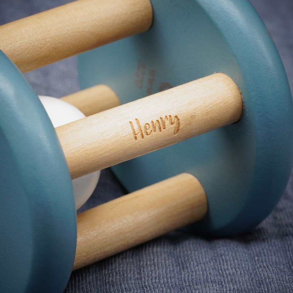 Wooden rolling rattle, blue